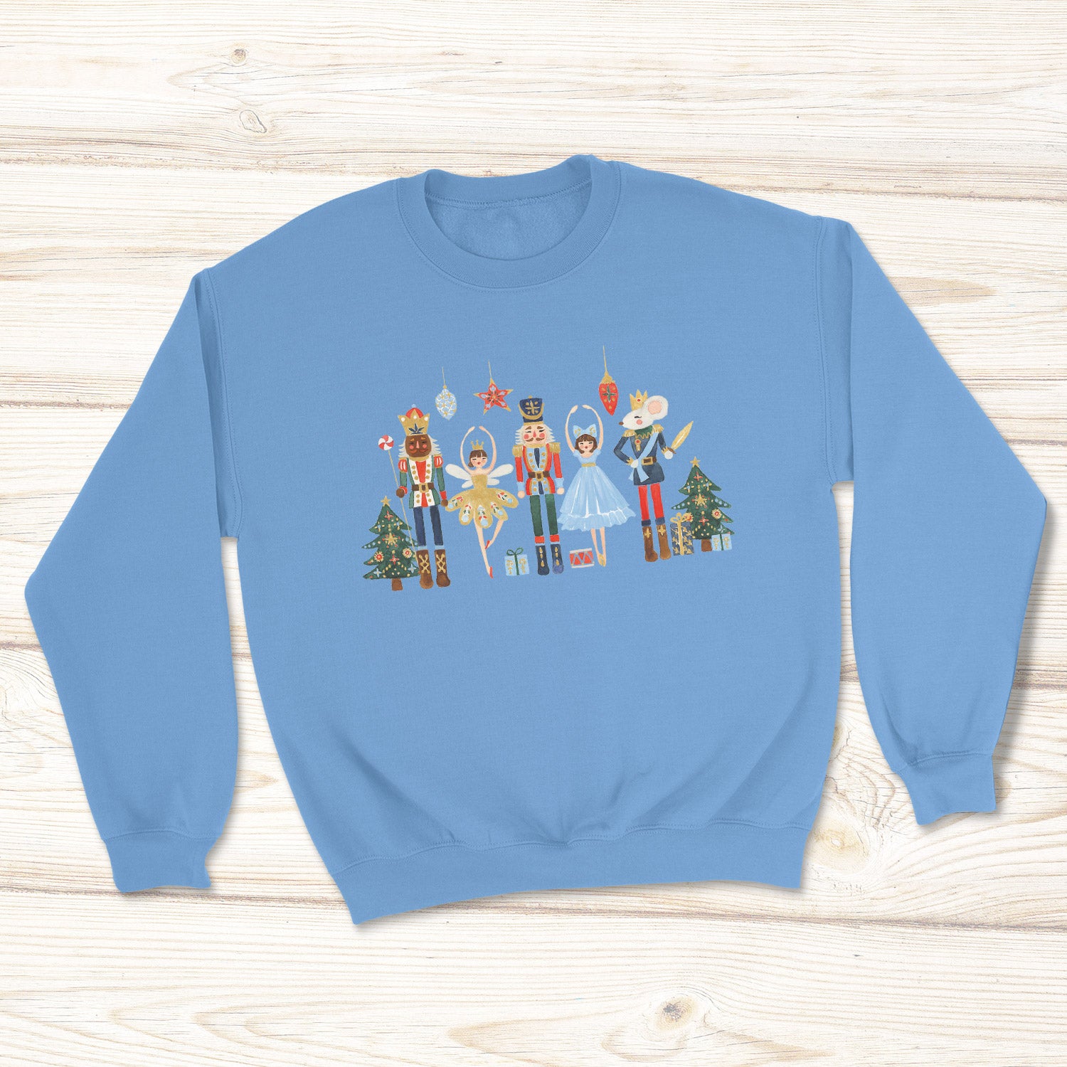Carolina blue sweatshirt with Native Nutcracker design.